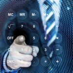 Businessman pointing at a virtual calculator representing financial planning and company incorporation.