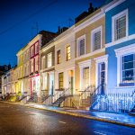 A street of houses in london in the evening