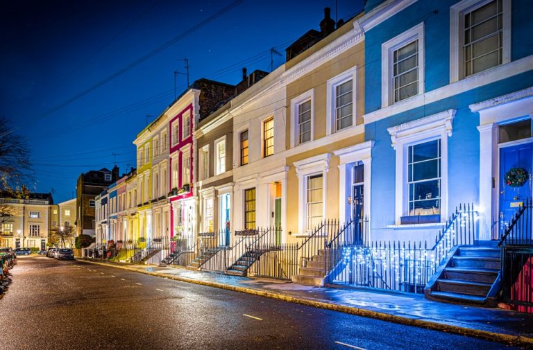 A street of houses in london in the evening