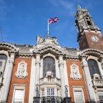 colchester town hall and flag asylum seekers landlords Serco property118.com