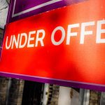 picture of under offer board outside house