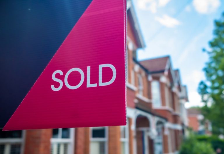 pic of a sold sign as stamp duty take rises property118.com