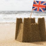 Pic of a snad castle and a union flag for holiday lets uk property118.com