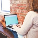 Young woman student typing in PBSA accommodation property118.com