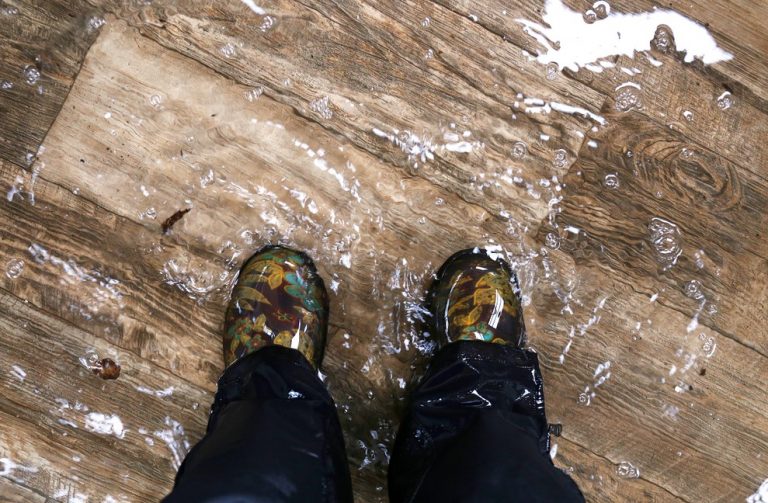 Pic of a leasehold hall being flooded landlord leaseholder property118.com