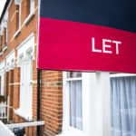 To let sign and a street of houses