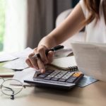 Woman landlord doing accounts software recommendations property118.com