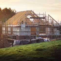 Built a new house – now struggling between splitting title and remortgaging?