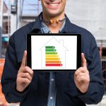 Pic of man holding EPC at commercial building property118