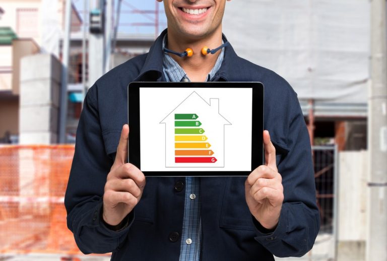 Pic of man holding EPC at commercial building property118