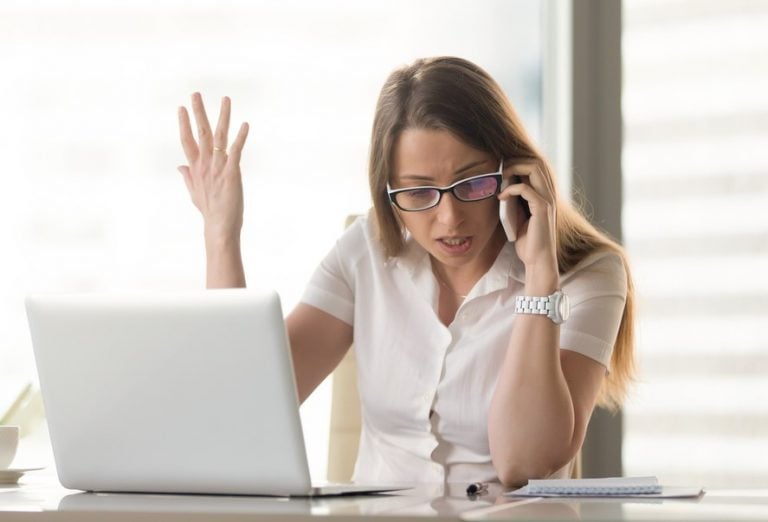 Pic of frustrated woman landlady dealing with UC helpline property118
