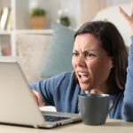 Fed up woman landlord at laptop troublesome student tenants property118.com