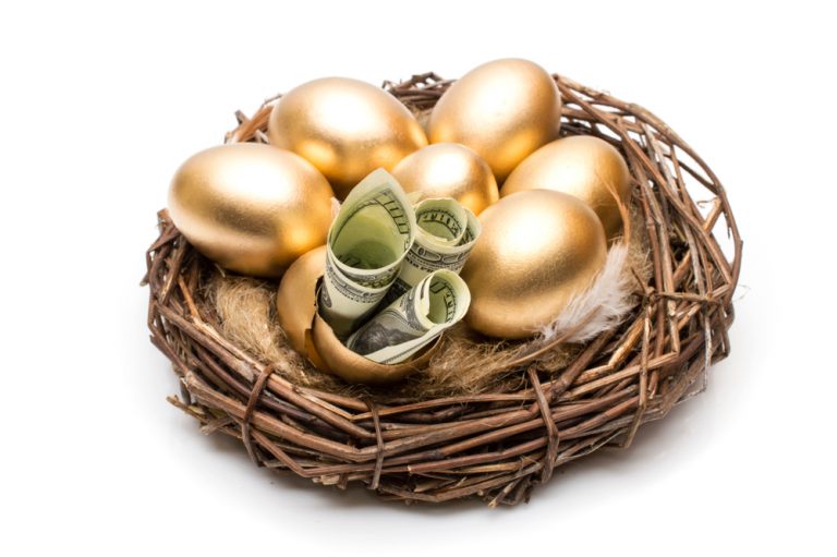 Golden eggs in a nest with cash representing releasing equity from property investments