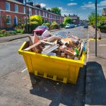 Pic of skip filled with rubbish alcoholic tenant landlord property118.com