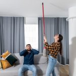 Woman with noisy tenant neighbour landlord issues property118.com