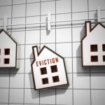 Illustration of houses with the word eviction, symbolising Section 21 rental evictions