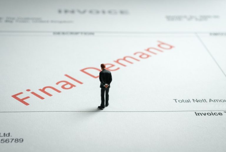 Man looking at a bill for a Community Infrastructure Levy fees for small developers property118