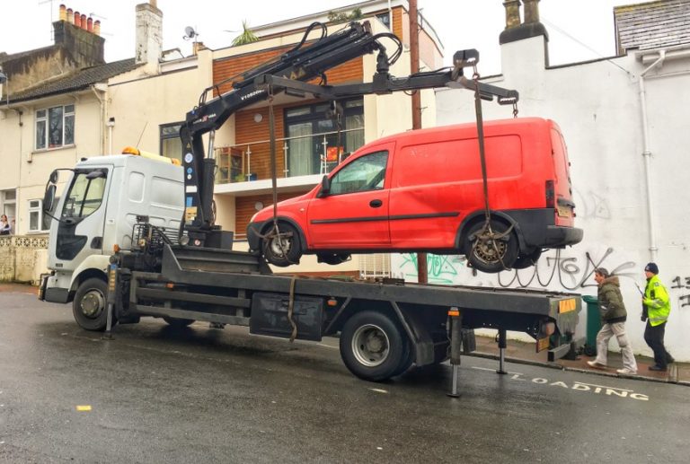 Pic of landlord legally removing a tenants car property118