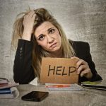 pic of woman landlord struggling with selective licensing forms property118