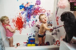 pic of children painting a bath and cat property118