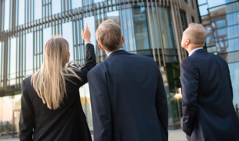Pic of landlords pointing at flats for a management company property118
