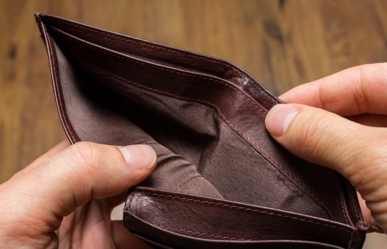 Pic of tenant with an empty wallet because of affordability issues over rent property118