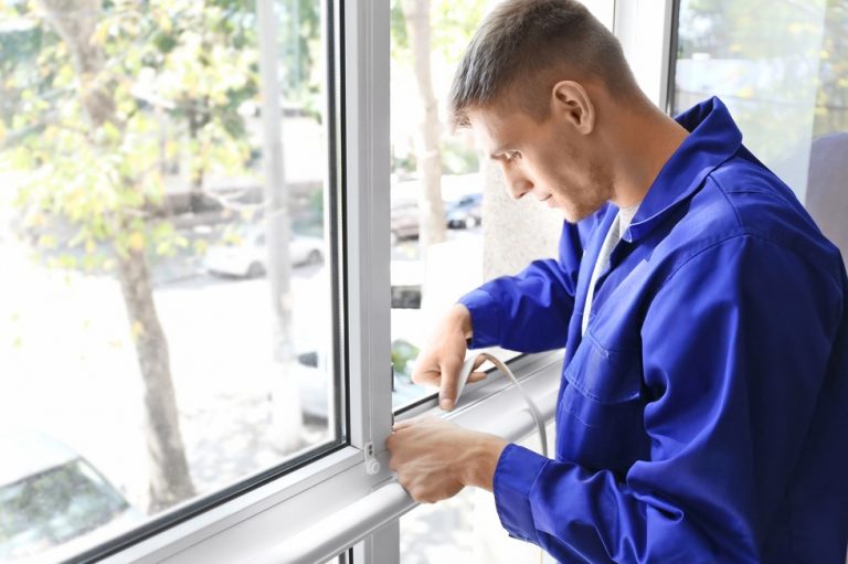 Pic of man repairing a window for tenants landlord compensation property118