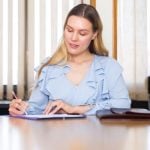 pic of a tenant signing tenancy contract property118