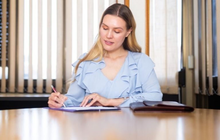 pic of a tenant signing tenancy contract property118