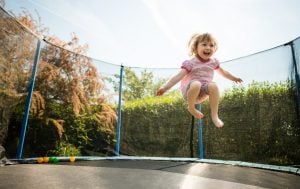 Pic of child on a trampoline - legal disclaimer to play property118