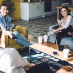 Students sitting around a coffee table