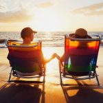 pic of two expats on a sunny beach - btl mortgages are harder to find property118