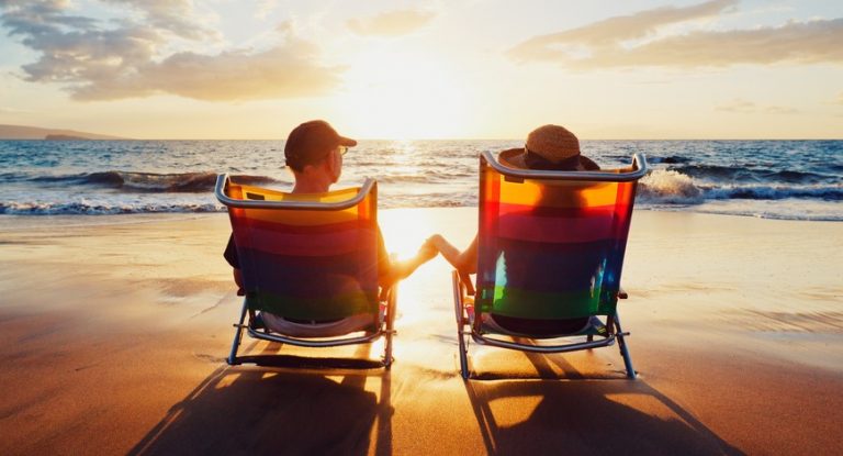 pic of two expats on a sunny beach - btl mortgages are harder to find property118