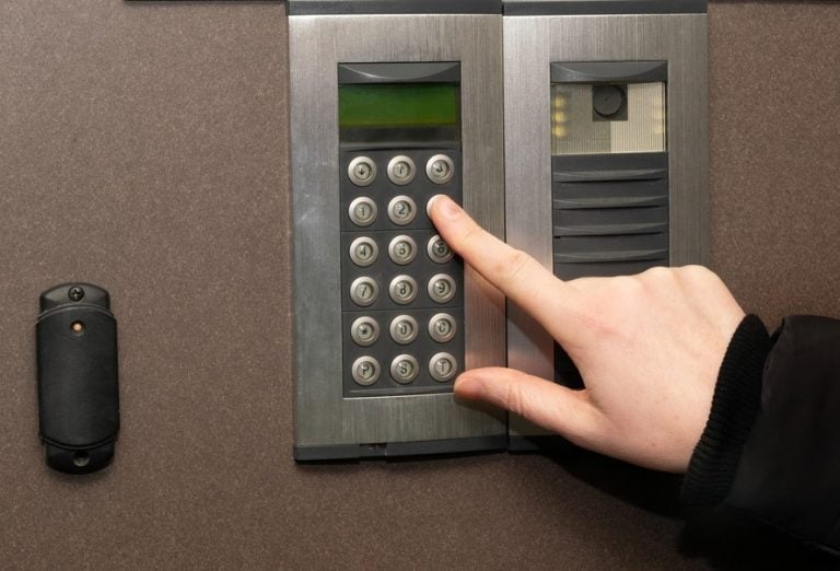 Pic of someone using an entryphone system permission needed to add one property118