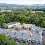 Houses surrounded by a trees