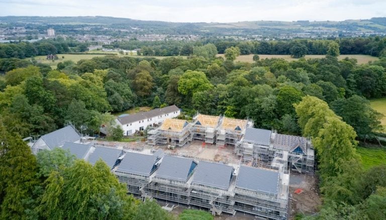 Houses surrounded by a trees