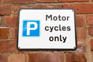 Pic of motorbike parking sign management company uses parking space property118
