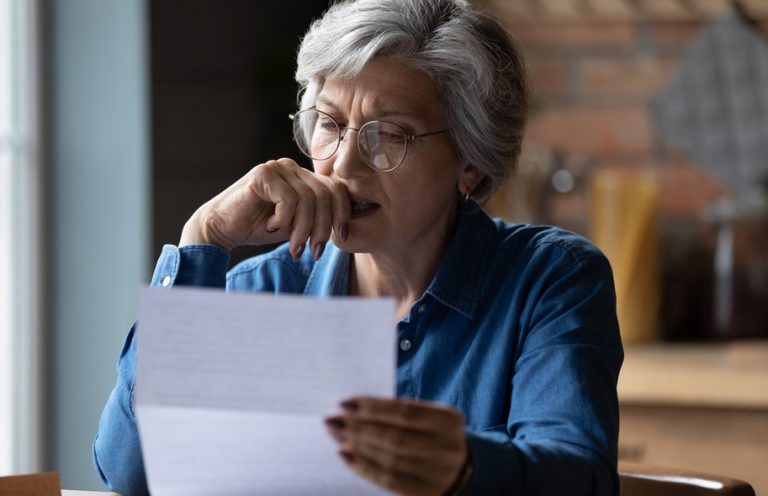 Pic of woman landlord and property ownership paperwork property118