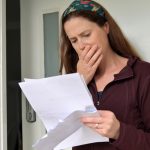 Pic of woman reading new mortgage deal property118