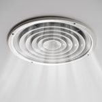 Ceiling-mounted positive input ventilation outlet releasing filtered air