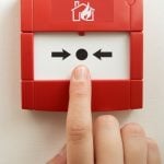 Pic of someone testing a fire alarm in a rented property landlord weekly fire test property118