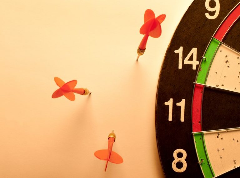 Pic of darts missing a dartboard as govt new build target will be missed property118