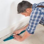 Pic of carpet fitter at work and landlord asking about long term tenancy property118