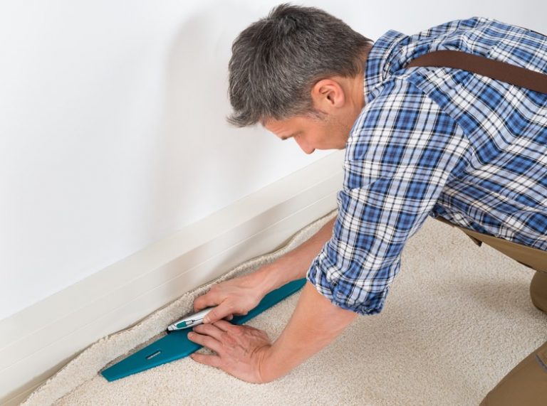 Pic of carpet fitter at work and landlord asking about long term tenancy property118