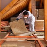 pic of man adding loft insulation as private renters need protecting from eviction if the work is carried out property118