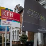 Estate agent boards outside rental properties in London highlighting demand in the private rental sector