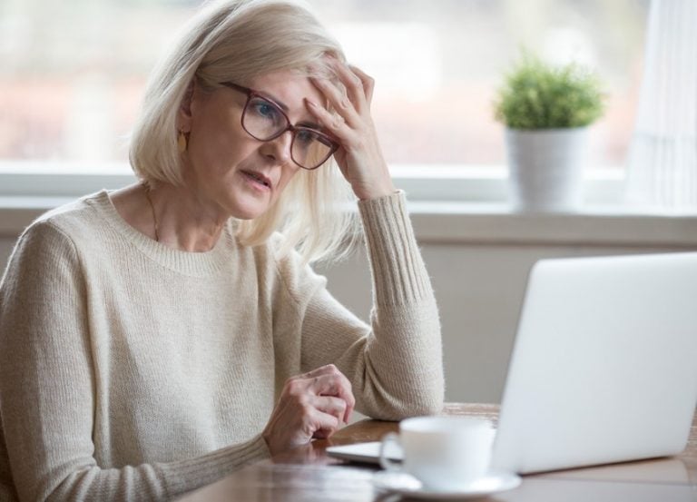 Pic of woman confused about DBS form and selective licensing needs property118