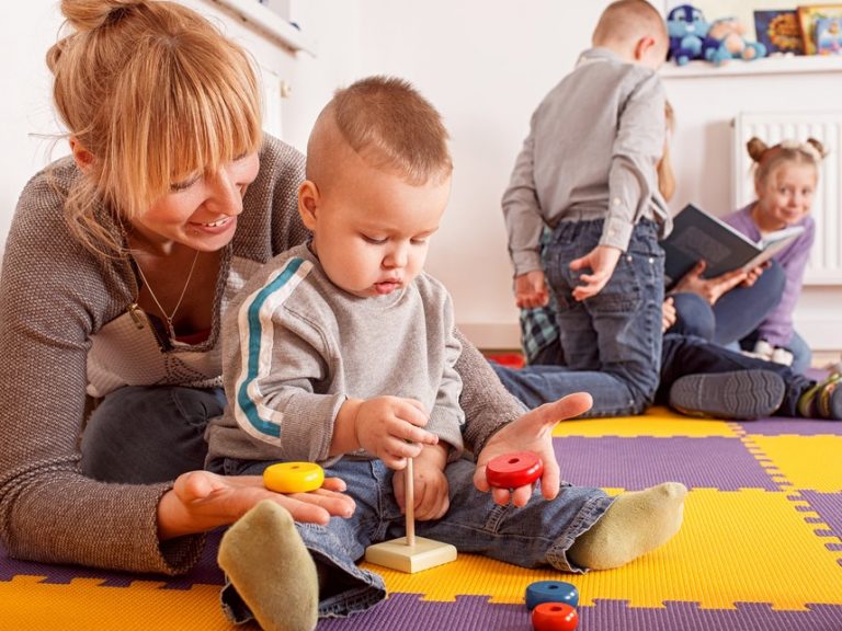 pic of childminder in a rented home with children property118