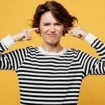 pic of woman with fingers in ears not communicating with landlord property118