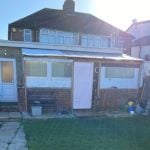 pic of landlord's house with a wrap around in breach of planning property118